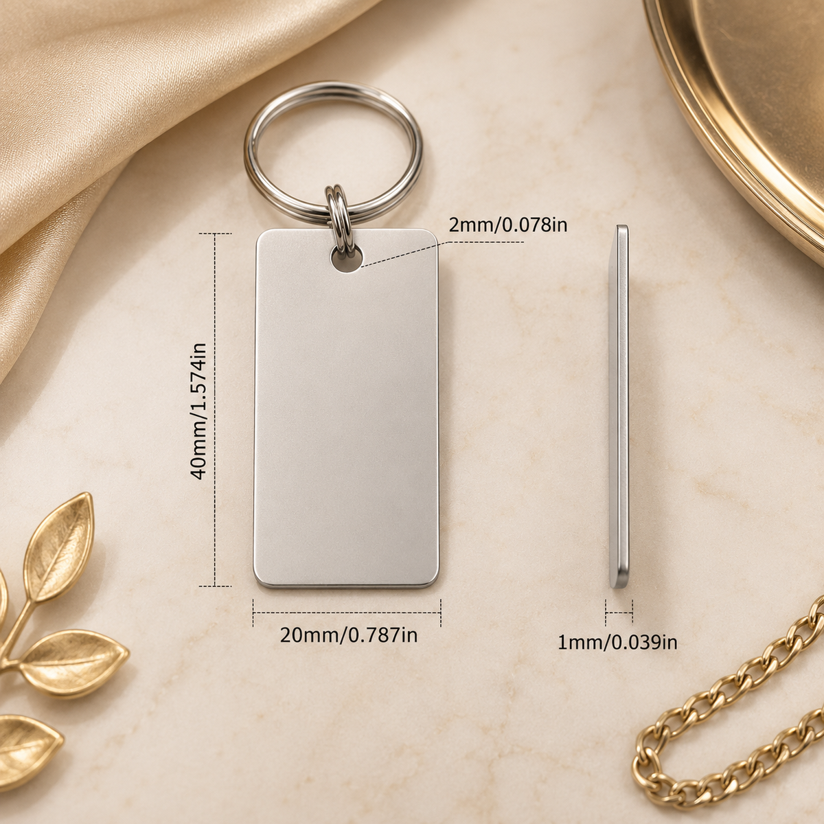 Klíčenka z nerezu s otvorem 40 × 20 × 1 mm, s gravírováním