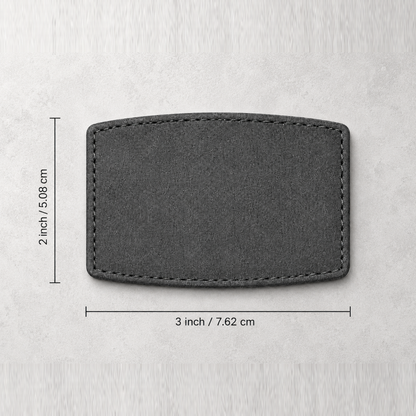 Nažehlovací šedá PU záplata – zaoblený obdélník 76,2 × 50,8 mm