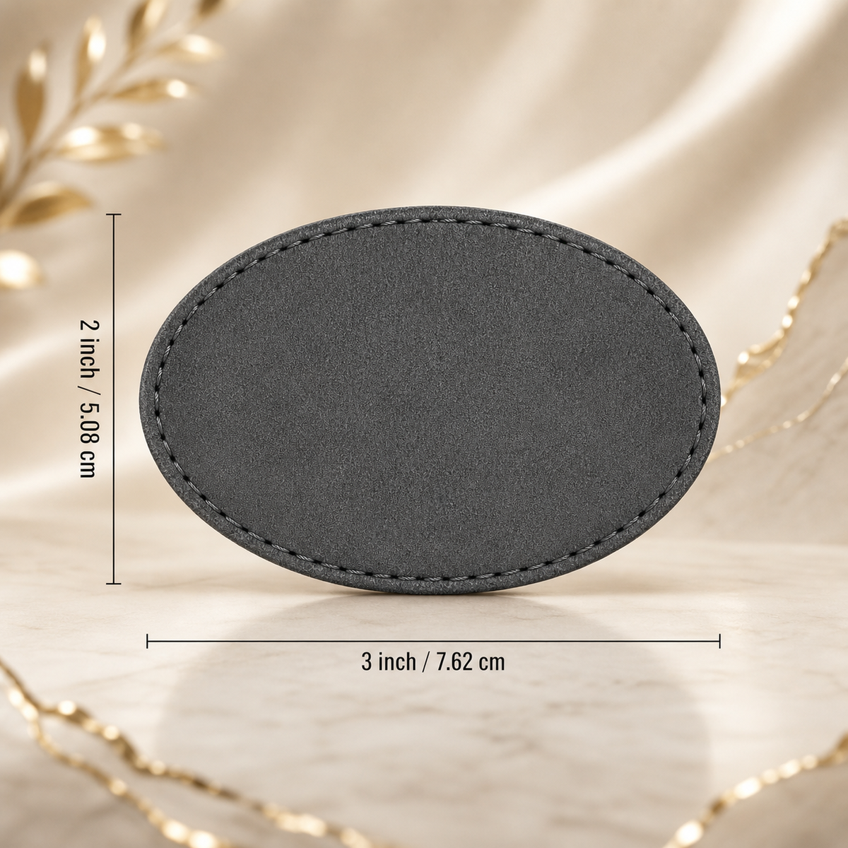 Šedá oválná nažehlovací PU koženková záplata 76,2 × 50,8 mm